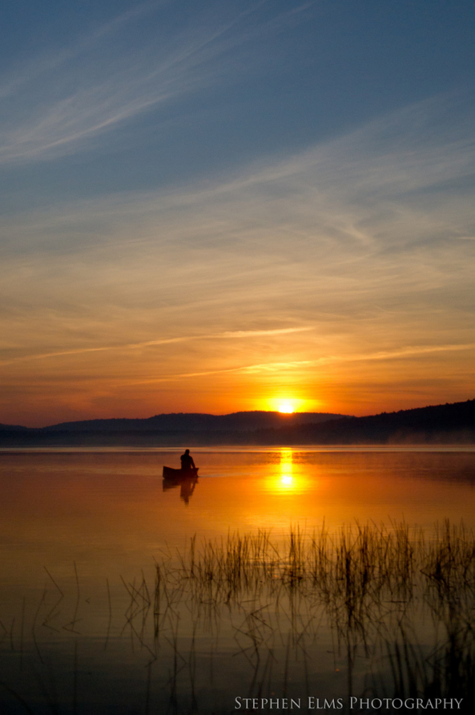 An early morning paddler on Lake of Two Rivers, Algonquin Park