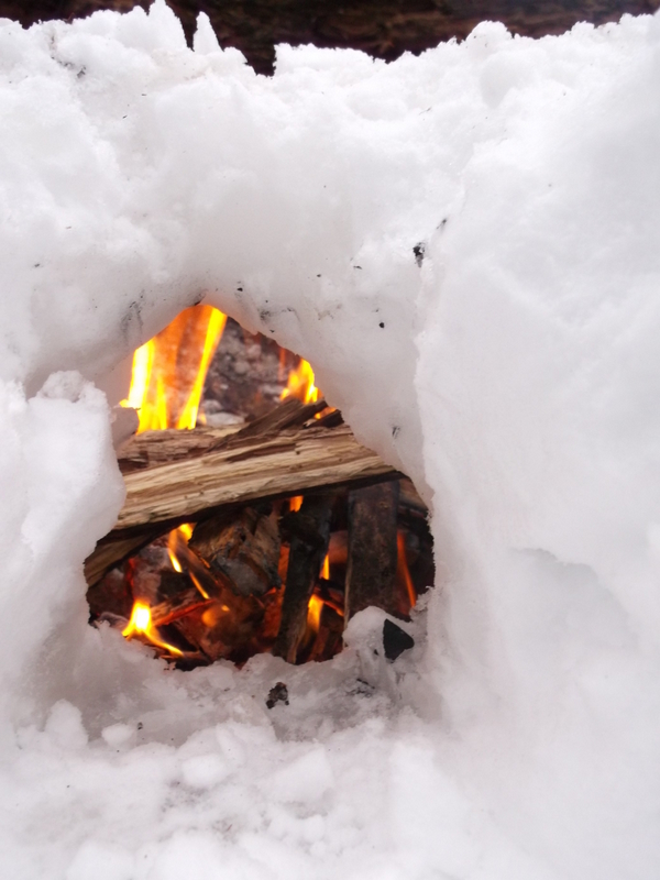 Making an Air hole for camp fire in winter - Algonquin