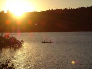 Canoeing in Quetico Provincial Park during sunset