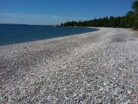 The cobble stone beach at halfway point of Orphan Lake trail loop (8km).