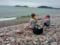 Snack break on the cobble stone beach at Gargantua Bay